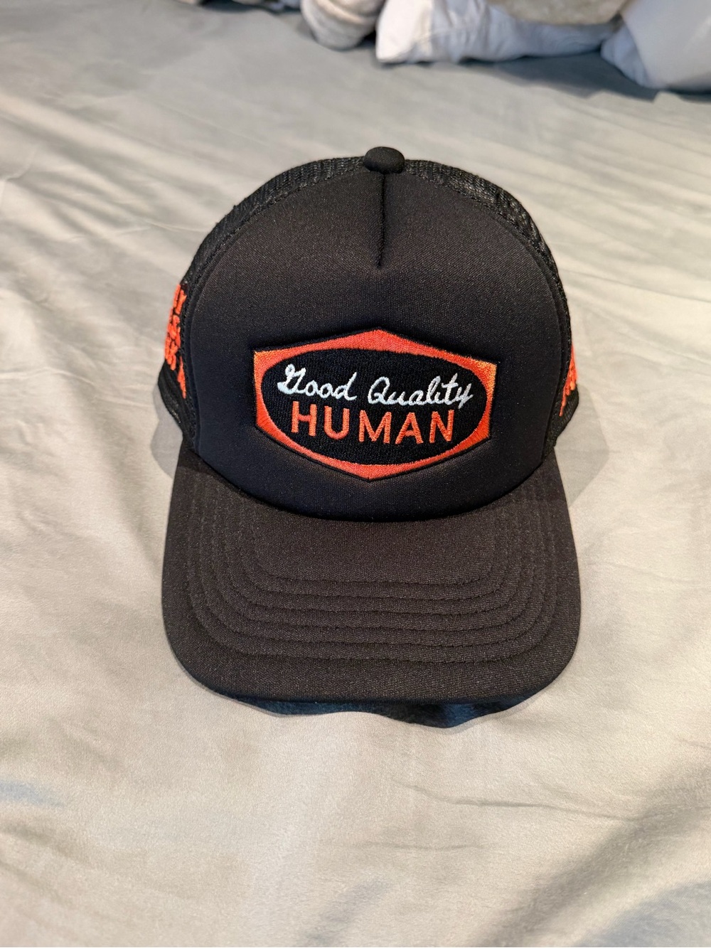 Good Quality Human Black Trucker Hat with Orange Patch